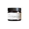 En krukke med Evolve Organic Beauty - Blue Tansy Beauty Balm 60 ml med sort baggrund.
